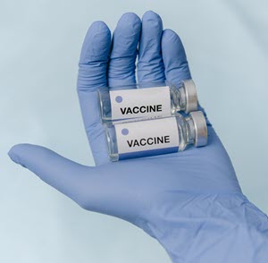 two vials of vaccine